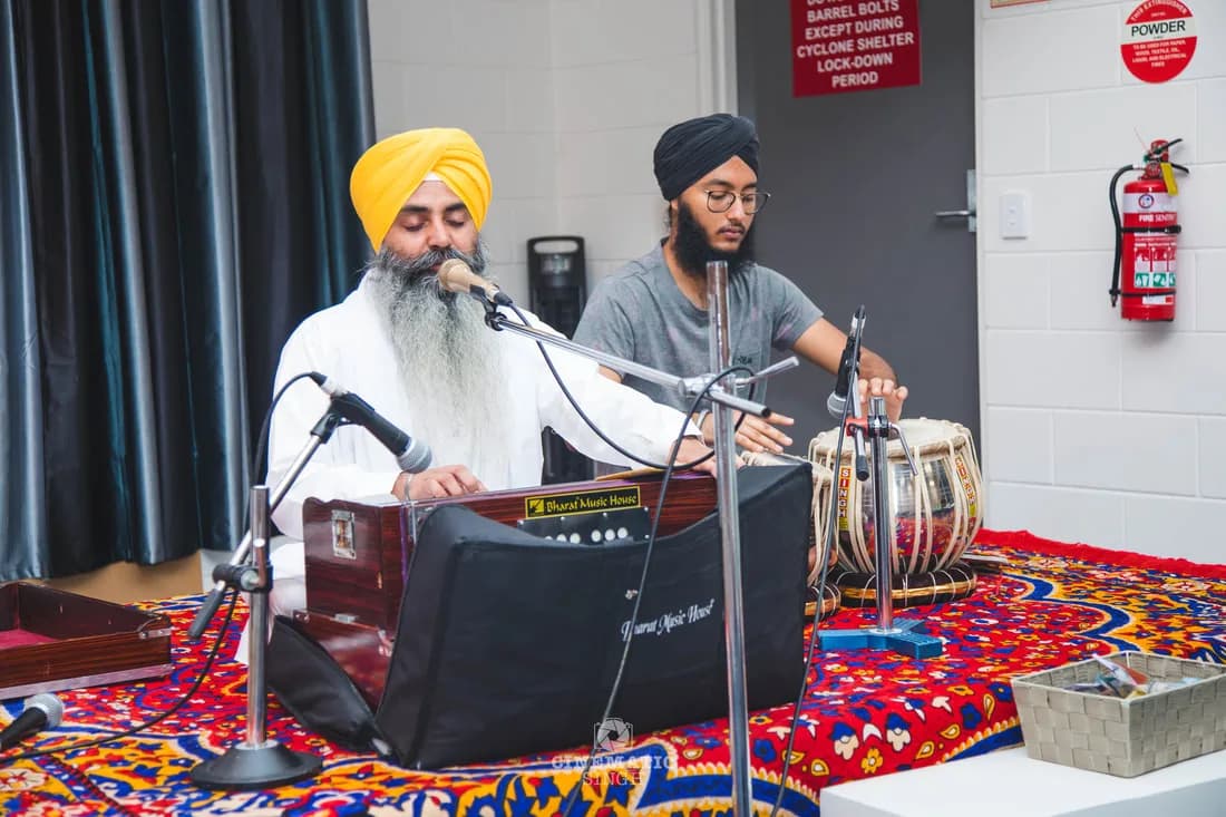 Ragi Jatha performing Shabad Kirtan on harmonium and tabla at Gurdwara Sahib Darwin