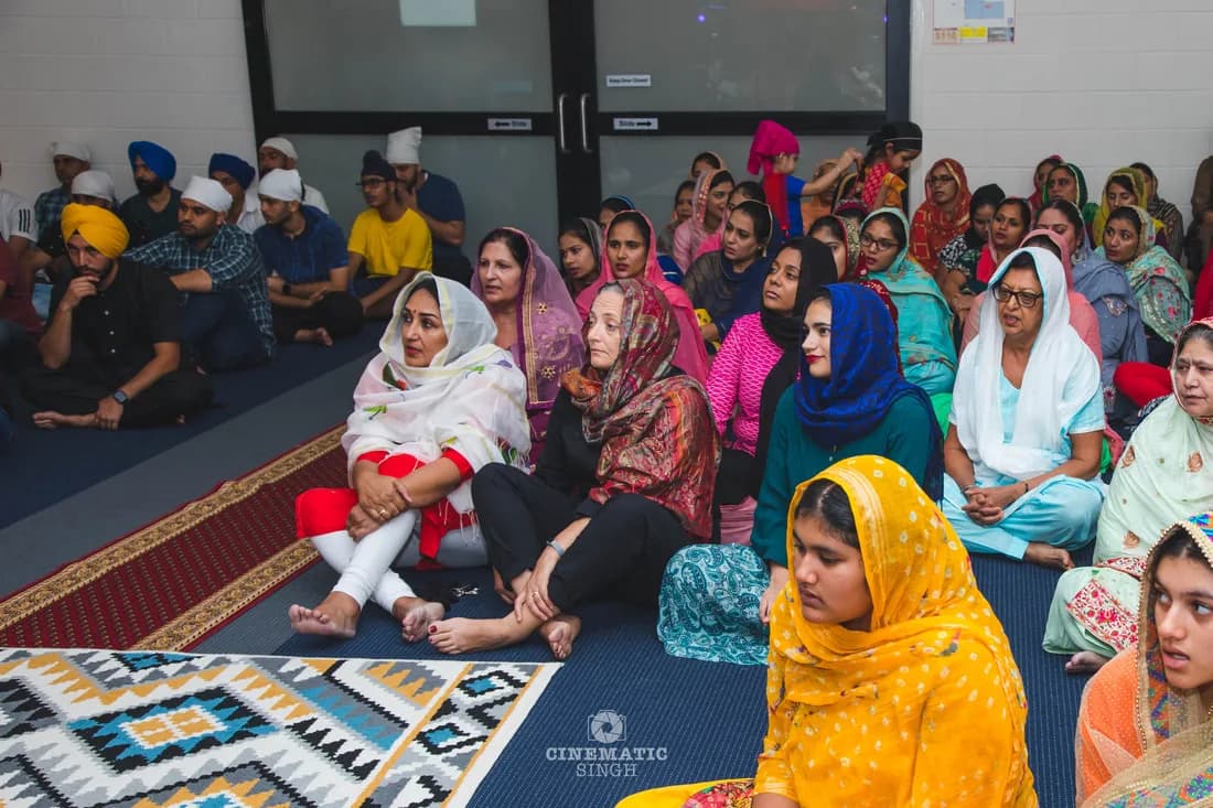 Darwin Sangat seated together in Pangat and congregation at Gurdwara Sahib Darwin